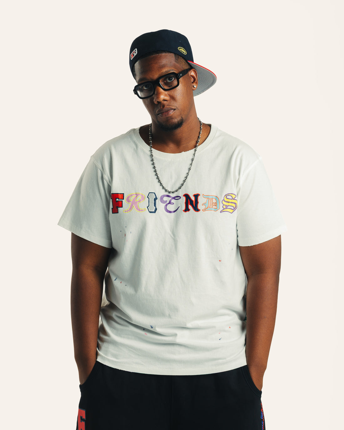 Vintage Friends Tee in white, relaxed front view on model