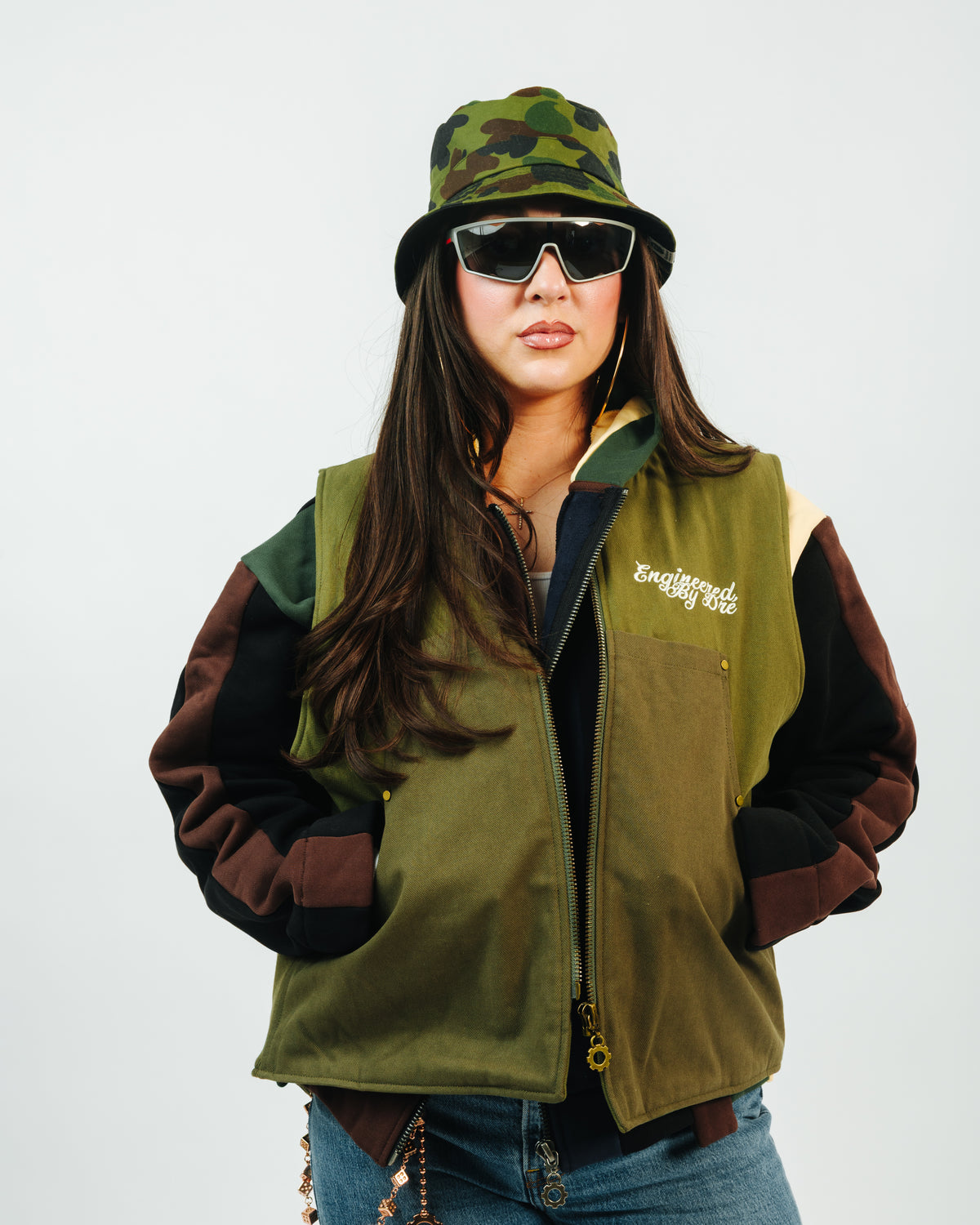 Model wearing the Triple Green Duck Vest layered over a workshirt